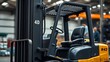 © zh10 - An industrial forklift in a warehouse setting with a blurred background.