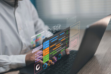 businessman working on laptop with virtual graphs calendar icons dashboard displayed representing pr