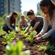 © Pete - Group of neighbors planting together in urban ecologic vegetable garden. People planting flowers, vegetables, growing plants. Community gardening lifestyle promotes healthy organic food and teamwork.