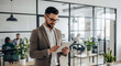© Passionwith - Focused businessman using digital tablet in modern office