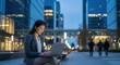 © patricia - Woman using laptop in city skyscrapers outdoor workspace