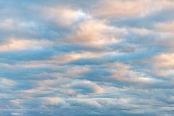 Wall Mural - Cloudscape sky background. Cloud in the sky. Background with cloud. Gloomy sky with overcast clouds. Overcast view. Skyscape and cloudscape. Sky with clouds. Cloudy skyscape background