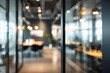 © ambo - Blurred view of modern office interior through glass partitions