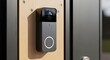 © AhmadMuslih - Modern smart video doorbell camera installed at a home entrance for security and surveillance