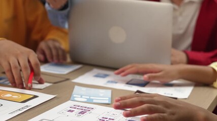 Wall Mural - panorama video of startup company employee planning on user interface prototype for mobile applicati