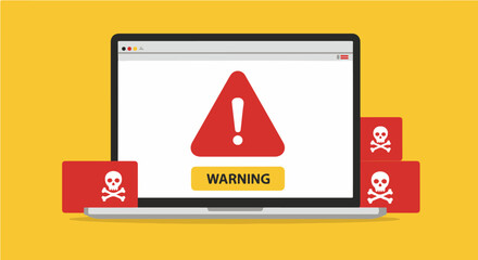 Laptop screen displaying a warning symbol with skulls, indicating a potential security threat.