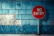 © Canary - 'NO ENTRY' sign board in front of the damaged blue brick wall. AI-generated.