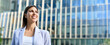 © Stock 4 You - Banner with profile portrait young beautiful hispanic woman corporate leader dreaming looking at copy space. European or latin mature executive female businesswoman at office business building outdoor