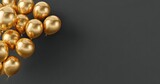 Golden balloons clustered at image's left on dark gray background