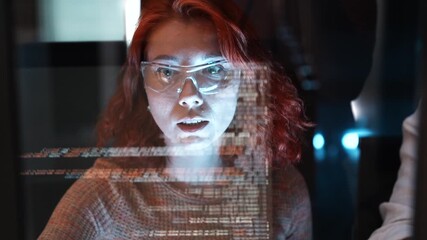 woman programmer and coding on computer screen for networking, malware or software at the office. female person, coder or developer working late in computer display in problem solving