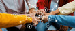 © InfiniteFlow - Startup company employee team stacking hand together symbolize successful group of business partnership and strong collective unity teamwork in community workplace in panoramic banner. Synergic Amity