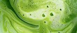© Adriana - frothy matcha latte with its signature vibrant green color and delicate swirling foam patterns, a macro and full-frame texture shot, close-up texture, top view
