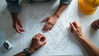 © natakot - Collaborative planning over architectural blueprints