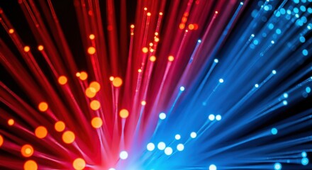 Abstract glowing fiber optic strands in vibrant red and blue colors creating a futuristic and energetic visual.