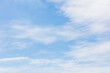 © two K - Thin Clouds Spreading Across a Bright Blue Sky