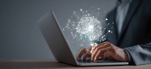 Person typing on a laptop, with a digital brain graphic overlaid