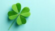 © Robert Kneschke - Four leaf clover on light green background symbolizing good luck and prosperity