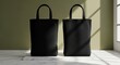 © Studio VIP - Two black cotton tote bags on marble platform, elegant editorial photography for premium product showcase