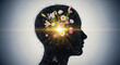 © Celt Studio - Beautiful mind concept with flowers blooming from human head silhouette, light glowing from within representing positive thoughts, emotional intelligence, and wellness