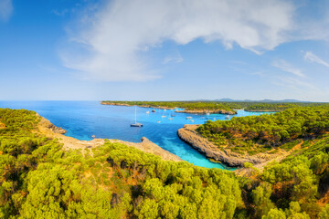 Wall Mural - Mallorca, Balearic Islands, Spain. Aerial view of yachts and boats in the bay. Marine life. Summer vacation in the Mediterranean. Postcard, background, wallpaper.