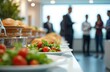 © Vadym - Office buffet features fresh salads, tomatoes, assorted snacks. Catering provides food for business meetings, parties, corporate gatherings. Employees enjoy relaxed lunch break with healthy