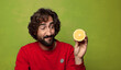 © kues1 - young adult bearded man with an orange
