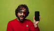 © kues1 - young adult bearded man with virtual glasses and phone