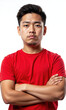 © panophotograph - Young Boy Frowning Red Shirt Isolated A medium shot captures a young Asian boy wearing a red t-shirt, looking at