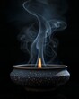 © Alim - Incense Burner with Rising Smoke on Black Backdrop