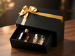© MonTeArt - Black luxury gift box with golden ribbon holding whiskey bottle and glass on wooden surface