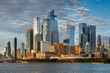 New York City skyline with Hudson Yards skyscrapers at sunset. View across the Hudson River showing modern architecture and cityscape of Midtown Manhattan, USA