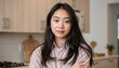 © Mamuangmi - Young Woman Posing Indoors in Modern Kitchen Lifestyle Photography Bright and Inviting Atmosphere