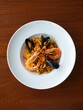 © TYSAMPON - Colorful Seafood Dish on a White Plate