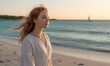 © soyin - Woman with red hair on beach at sunset (1)