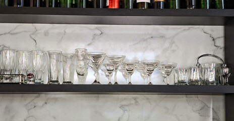 Empty glasses on display in a coffee shop