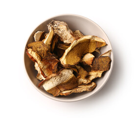 Wall Mural - bowl with tasty dried mushrooms on white background