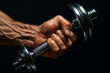 © ZAY - Close-up of a muscular hand gripping a dumbbell, showcasing strength, veins, and determination.