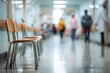 © Atom - Blurred hospital hallway with waiting chairs