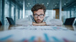 © Enrique - businessman looking concerned. looking at risk table on board in front, office conference room