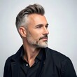 © Tatimurmurprint - Confident middle aged man with gray hair and beard in profile looking sideways
