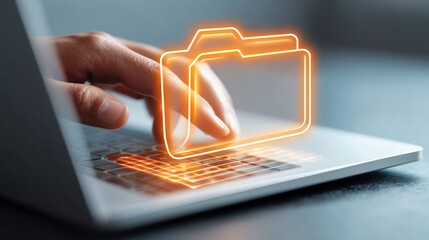 A person's hand interacts with a laptop, overlaid with a glowing orange folder icon, representing digital data.