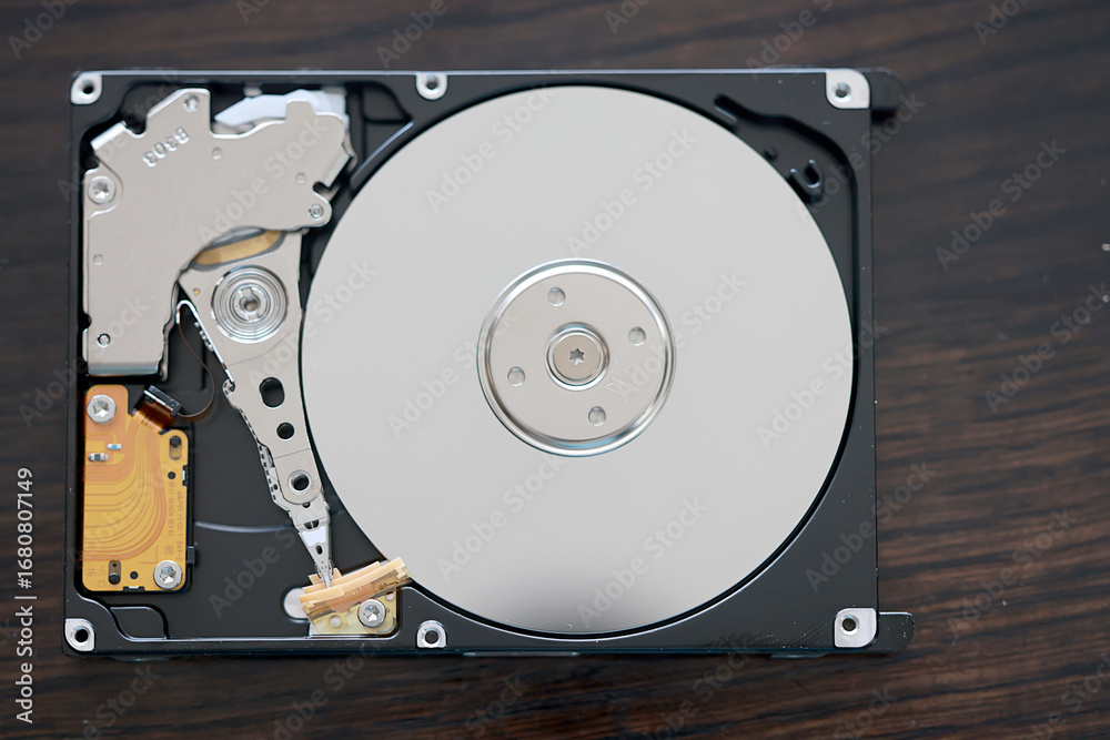 computer hard disk in close-up, disassembled, view inside, computer ...