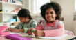 © peopleimages.com - Portrait, drawing or girl in classroom for learning education, paper or solution with students. Smile, artistic or creative kids at school for child development, assessment or knowledge evaluation