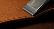 © Guilherme - Trimming Edge of Brown Leather with Metal Beveling Tool