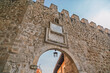 Brihuega, Spain. Low-angle view of the historic city gate and defensive wall 