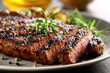 © LimeSky - Close up of a plated grilled beef steak