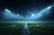 © KALIUMM - An empty American football stadium field at night with bright lights and atmospheric fog.