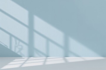 Wall Mural - simple backdrop for showcasing products with light and shadow on a blue surface