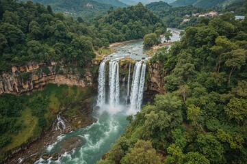 Wall Mural - bird's-eye perspective of a cascading waterfall