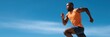 © Iryna - Young african male runner in motion under clear blue sky